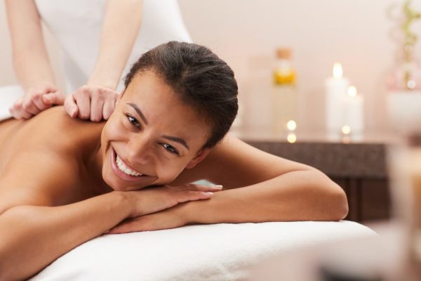 smiling-woman-enjoying-massage-1024x682